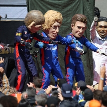 SPA, BELGIUM - AUGUST 25:  Performers dressed as Romain Grosjean of France and Haas F1, Max Verstappen of Netherlands and Red Bull Racing, Brendon Hartley of New Zealand and Scuderia Toro Rosso, Pierre Gasly of France and Scuderia Toro Rosso and Lewis Hamilton of Great Britain and Mercedes GP entertain the crowds during qualifying for the Formula One Grand Prix of Belgium at Circuit de Spa-Francorchamps on August 25, 2018 in Spa, Belgium.  (Photo by Charles Coates/Getty Images) // Getty Images / Red Bull Content Pool  // AP-1WPURQKDW2511 // Usage for editorial use only // Please go to www.redbullcontentpool.com for further information. //